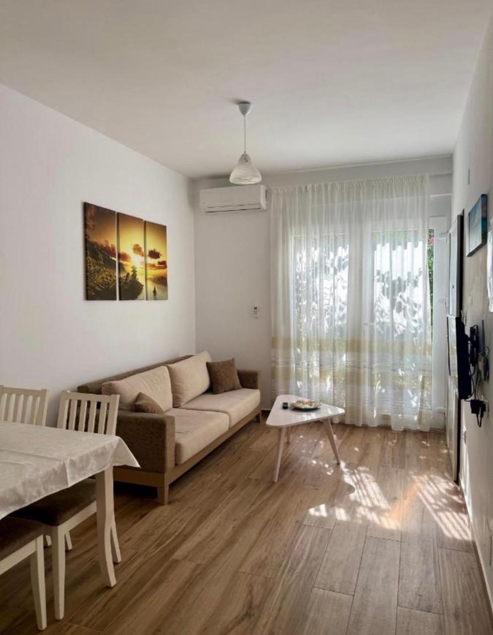 Living room with beige sofa and garden light
